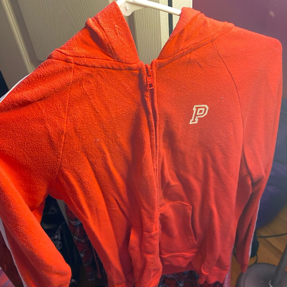 Red zip up sweater